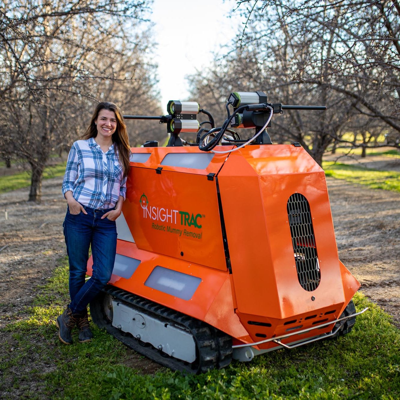 Anna with InsightTRAC Rover in Almond Orchard